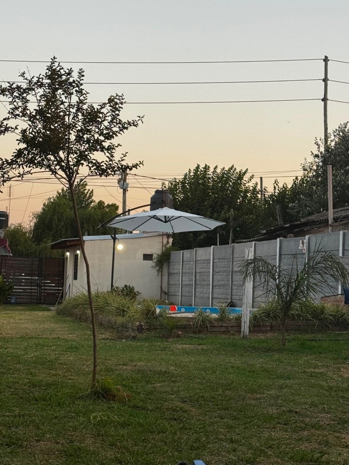 Venta de lote con quincho y monoambiente.