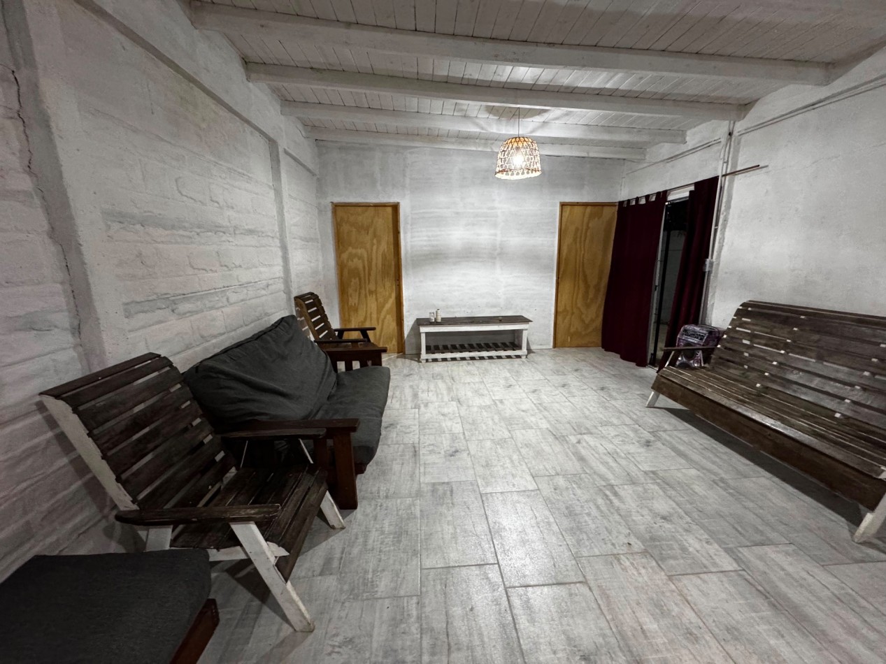 Venta de lote con quincho y monoambiente.