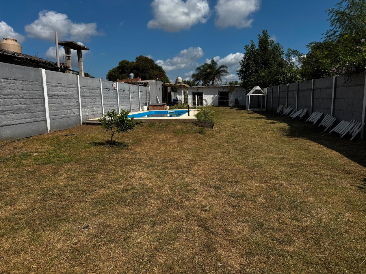 Venta de lote con quincho y monoambiente.