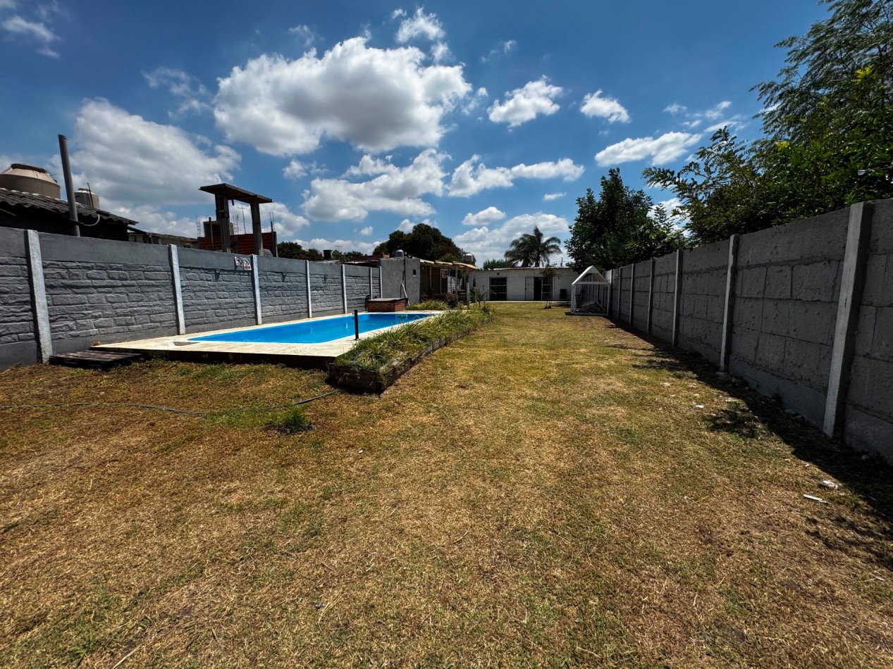Venta de lote con quincho y monoambiente.